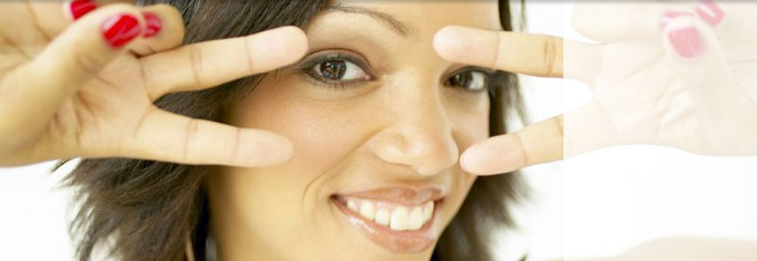 woman in hat green background